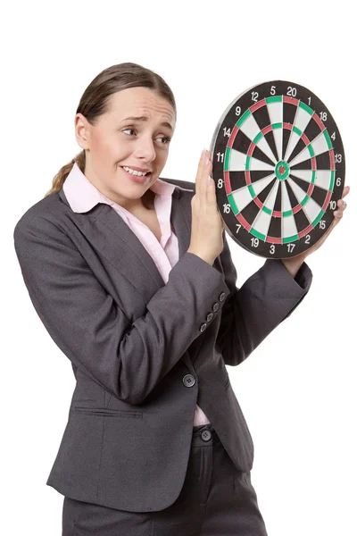 Zakelijke vrouw bedrijf dartbord — Stockfoto