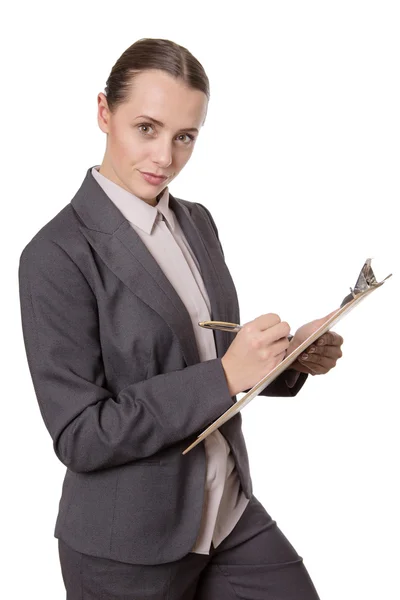 Woman holding clipboard — Stock Photo, Image