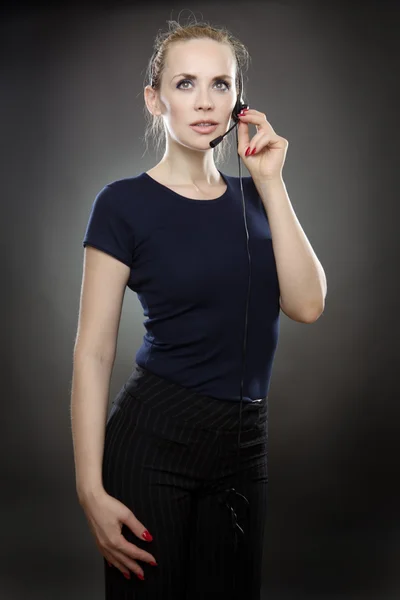 Kobieta biznesu na zestaw słuchawkowy — Zdjęcie stockowe