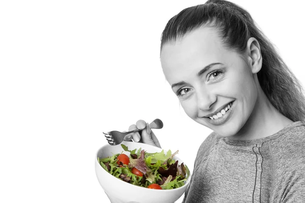 Fitness femme manger de la salade — Photo