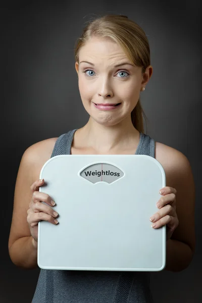 Model holding scales — Stock Photo, Image