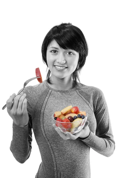 Fitness model with fruit salad — Stock Photo, Image