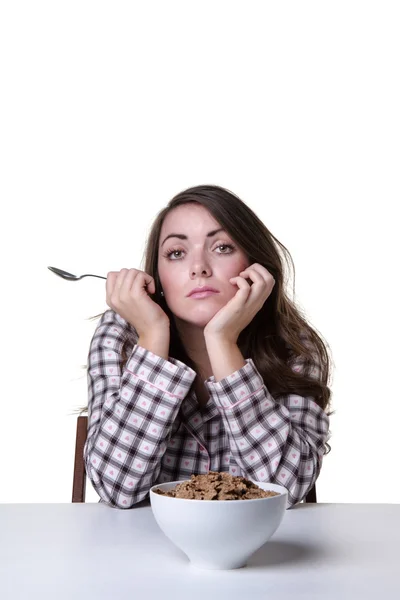 Tired model with breakfast — Stock Photo, Image