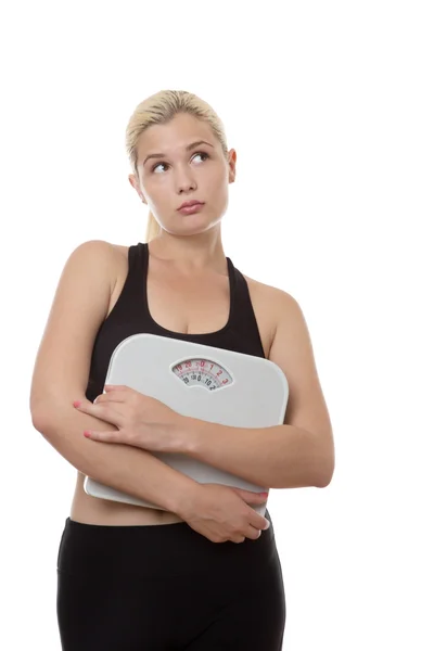 Woman holding weight scales — Stock Photo, Image