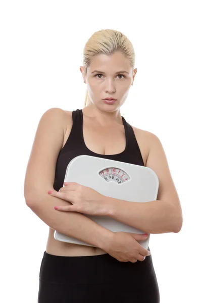 Woman holding weight scales — Stock Photo, Image