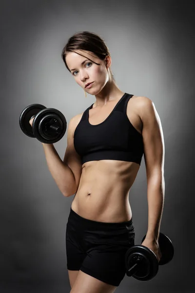 Fitness žena, která dělá cvičení Stock Obrázky