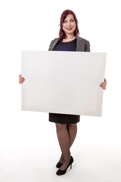 Smiling woman holding blank card — Stock Photo, Image