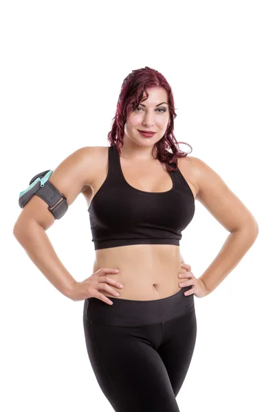 Fitness žena nosit sluchátka a mp3 přehrávač. — Stock fotografie