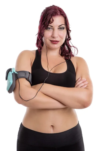 Fitness-Frau trägt Kopfhörer und MP3-Player. — Stockfoto