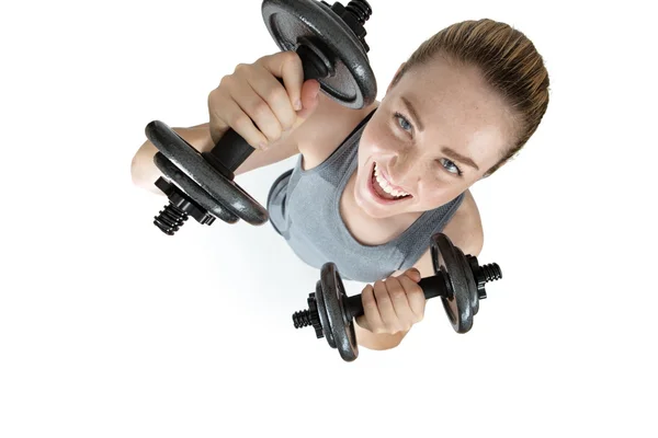 Fitness vrouwelijke uitoefenend met dumbells — Stockfoto