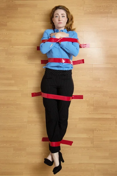 Woman stuck to the floor — Stock Photo, Image