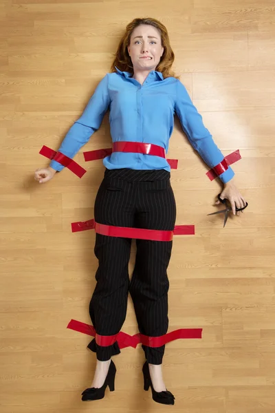 Woman tapped to the floor — Stock Photo, Image