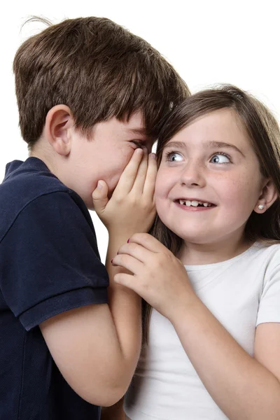 Niños compartiendo un secreto — Foto de Stock