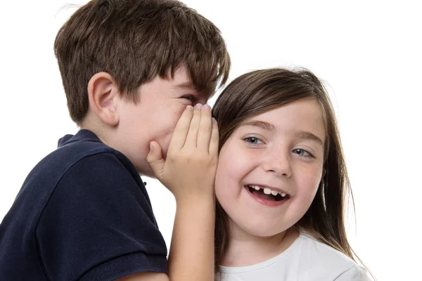 Niños compartiendo un secreto — Foto de Stock