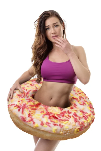 Donut grande alrededor de la mujer — Foto de Stock