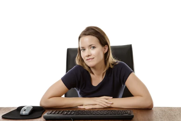 Mujer de negocios sentada en el escritorio —  Fotos de Stock