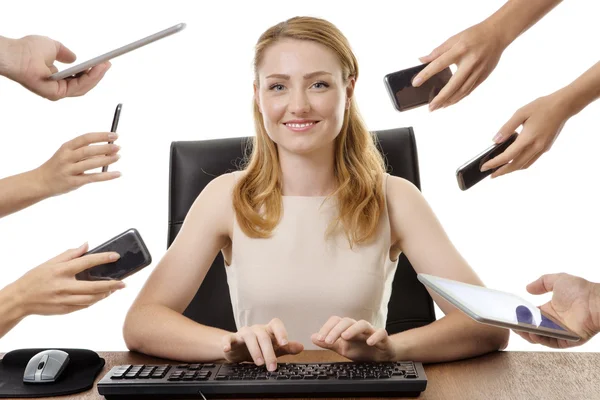 Business woman sitting at desk — Stock Photo, Image