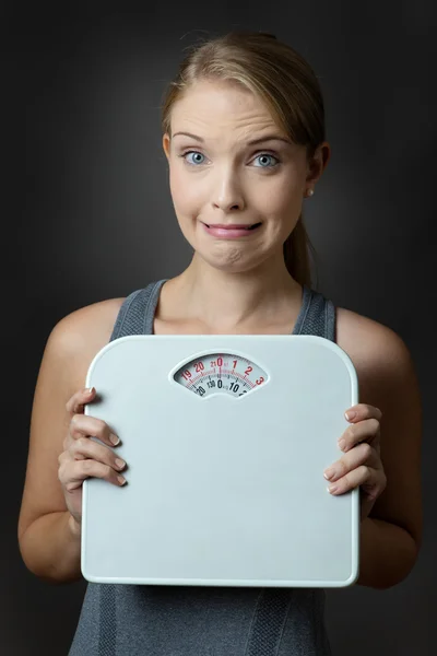 Model holding scales — Stock Photo, Image