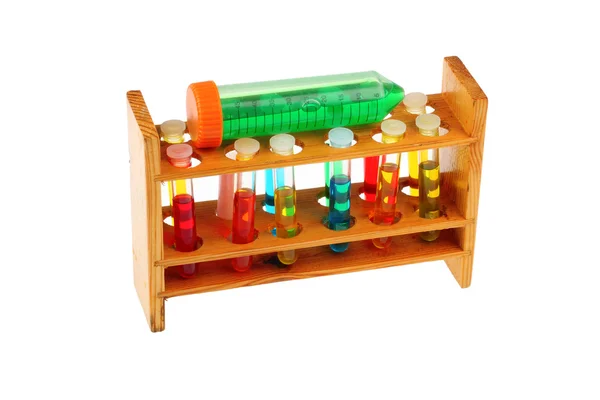 Test tubes in a old fashioned wooden rack — Stock Photo, Image