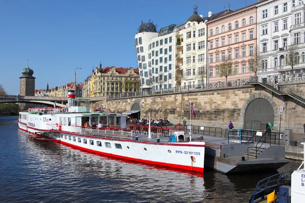 Boat on Vltava river near Juraskuv bridge — Stock Photo, Image