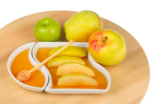 Manzanas y rodajas de manzana en miel — Foto de Stock