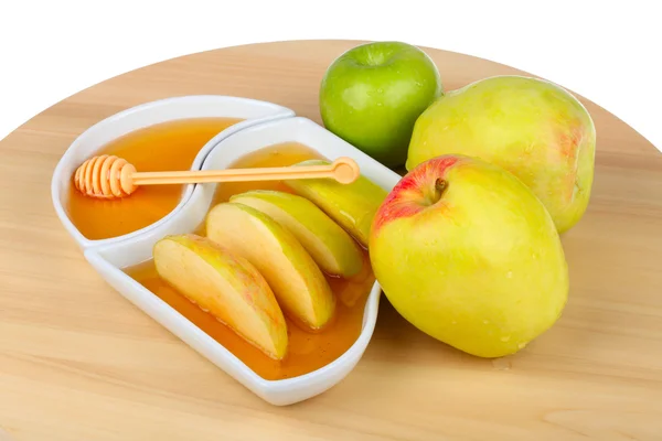 Apples and dipping slices of apple in honey — Stock Photo, Image