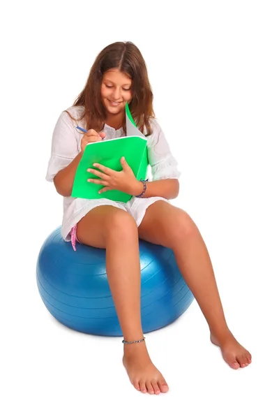 Ittle girl with notebook — Stock Photo, Image