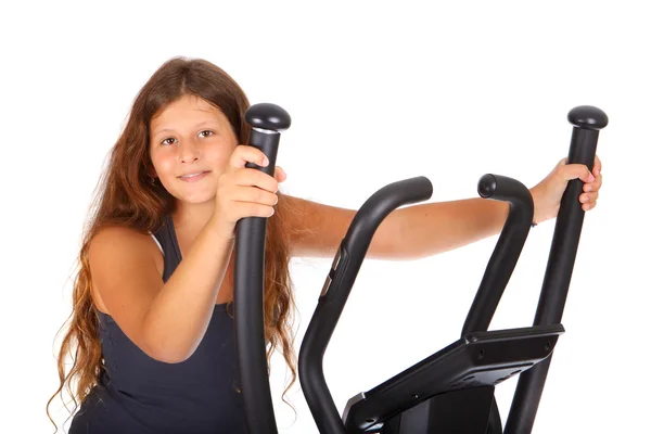 Meisje met de elliptische trainer — Stockfoto