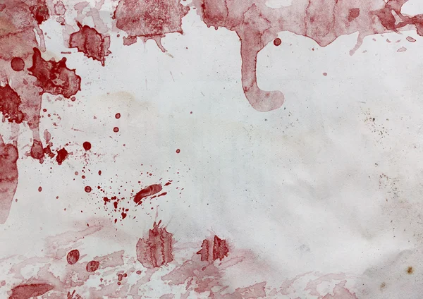 Väderbitna papper med röda blodfläckar och droppar — Stockfoto