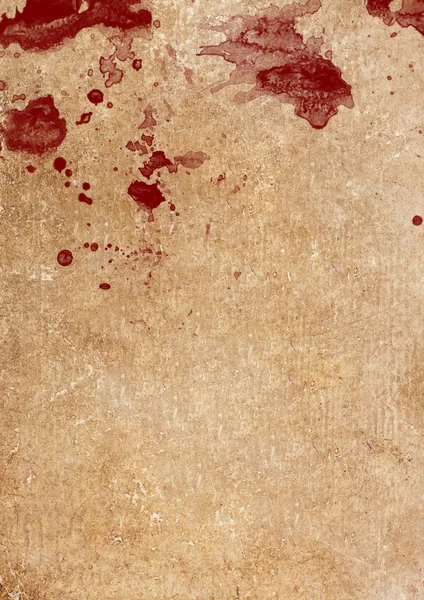 Blood drops and splatters on aged paper Stock Photo