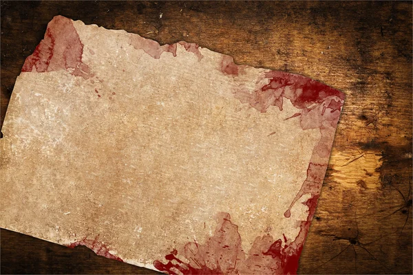 Verweerde papier met bloedvlekken — Stockfoto