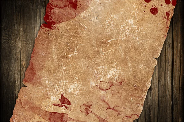 Dark old paper with blood stains — Stock Photo, Image