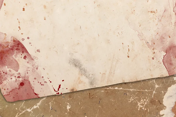 Verblichene alte Papiere mit roten Flecken — Stockfoto