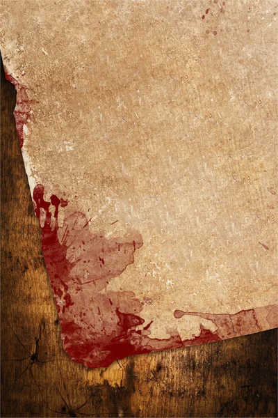 Weathered paper with blood stains Stock Photo