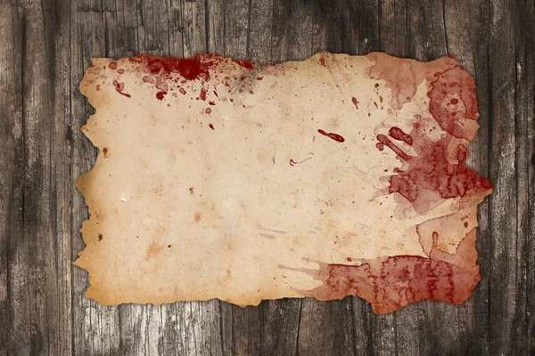 Bloody old paper on wood — Stock Photo, Image