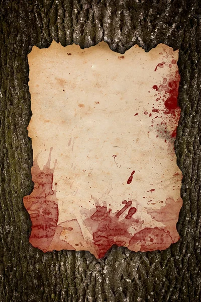 Damaged paper with red blood stains on wood — Stock Photo, Image