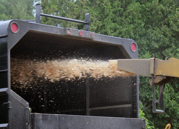 Wood chipper at work Stock Picture