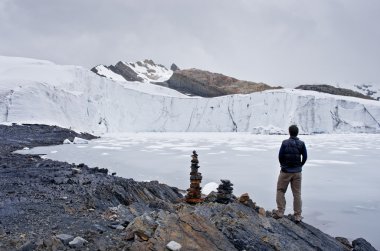traveler on Pastoruri glacier clipart