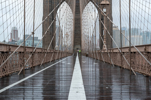 Brooklyn Bridge at rainy day in New York. USA