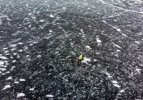 Iceboat on a frozen lake, winter sport. Aerial view