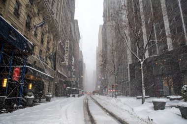 New York, NY USA - February 1, 2021: Snow storm on East Coast, New York City. Manhattan During Nor'easter Blizzard clipart