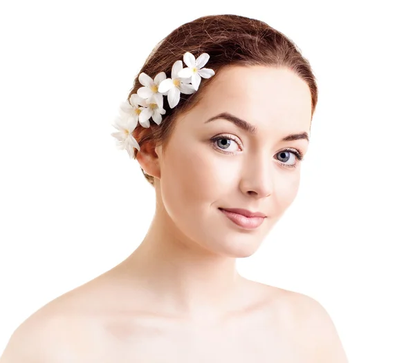 Mujer con flores en el pelo —  Fotos de Stock