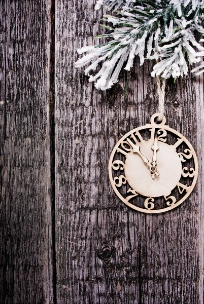 Clock on fir tree branch — Stock Photo, Image