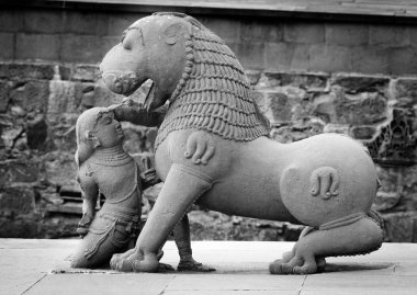 Stone sculpture in Hindu temple in Khajuraho clipart