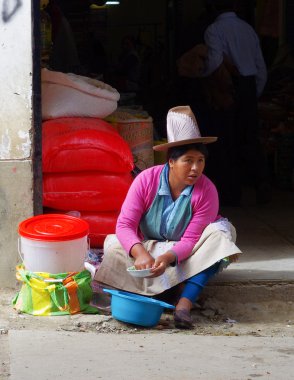 Peruvian woman on street market