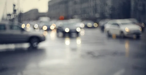 Unscharfer Hintergrund Mit Der Stadtstraße Mit Autos Der Dämmerung Nach — Stockfoto