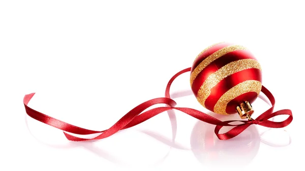 Striped New Year's ball with a red tape. — Stock Photo, Image