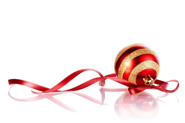 Striped New Year's ball with a red tape. — Stock Photo, Image