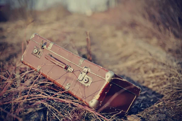 Old fashioned vintage forgotten a suitcase — Stock Photo, Image