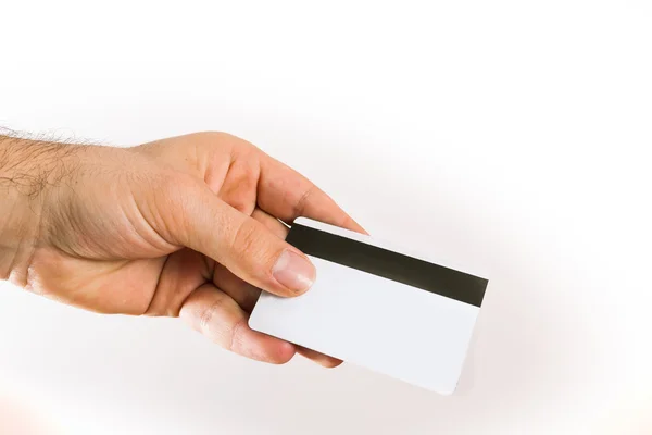 Hand hebt van een credit card — Stockfoto